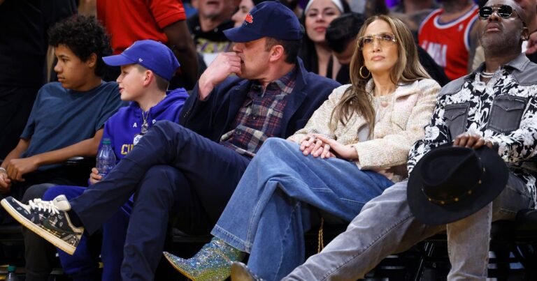 Jennifer Lopez Makes a Compelling Case For Wearing Impractical Sequin Boots at a Basketball Game 1